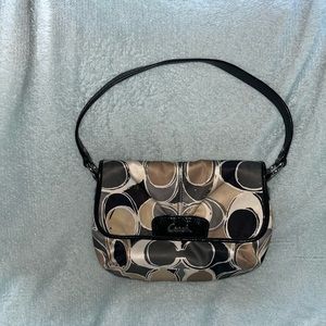 Coach purse, small with short strap.